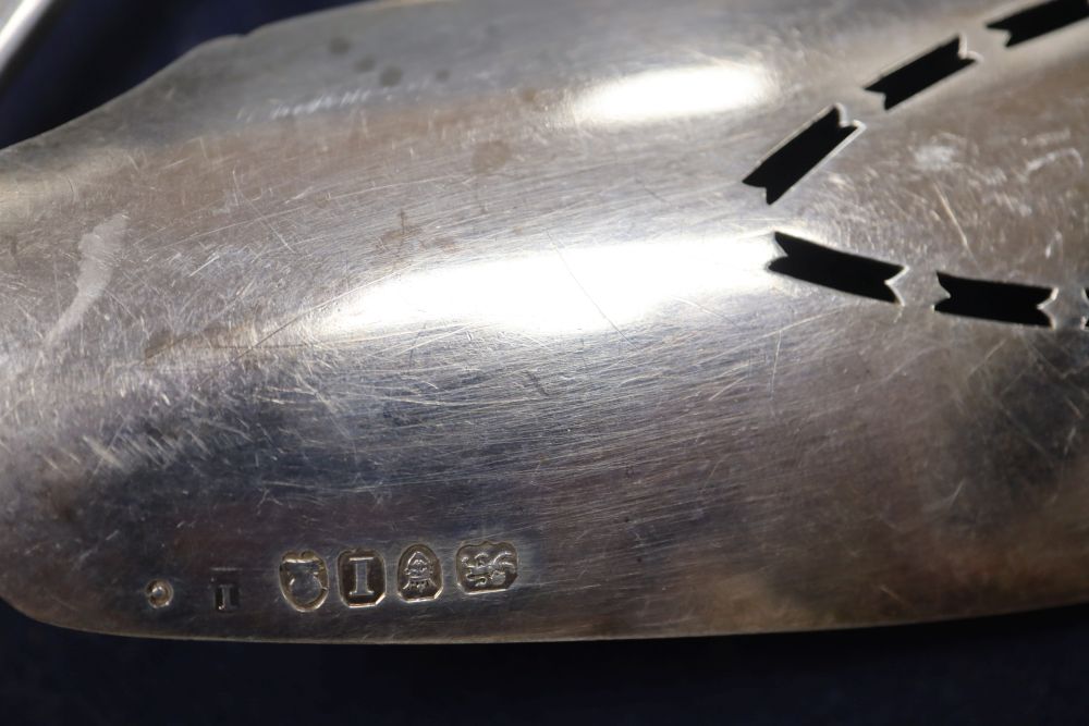 A group of Georgian silver serving spoons, tablespoons and a fish slice